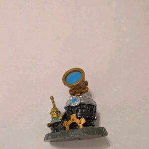 Gold and Blue Toy Figure